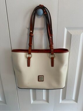 Dooney & Bourke Cream Pebble Leather Tote with Brown Trim and Red Interior